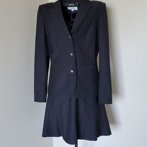 Black pin striped Calvin Klein suit